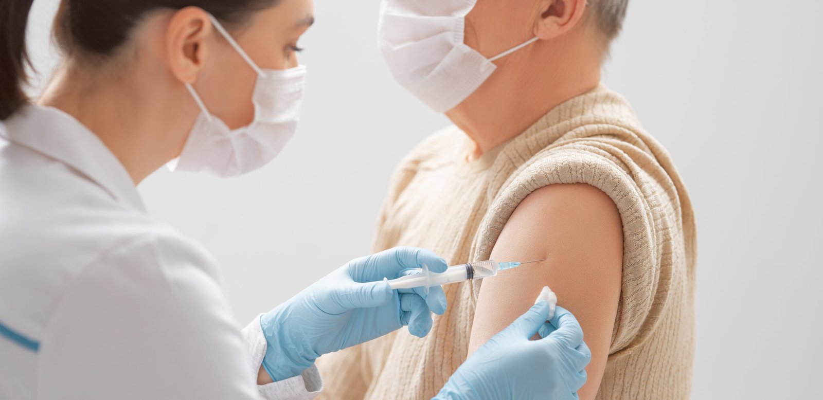 Man getting his Covid 19 vaccinations